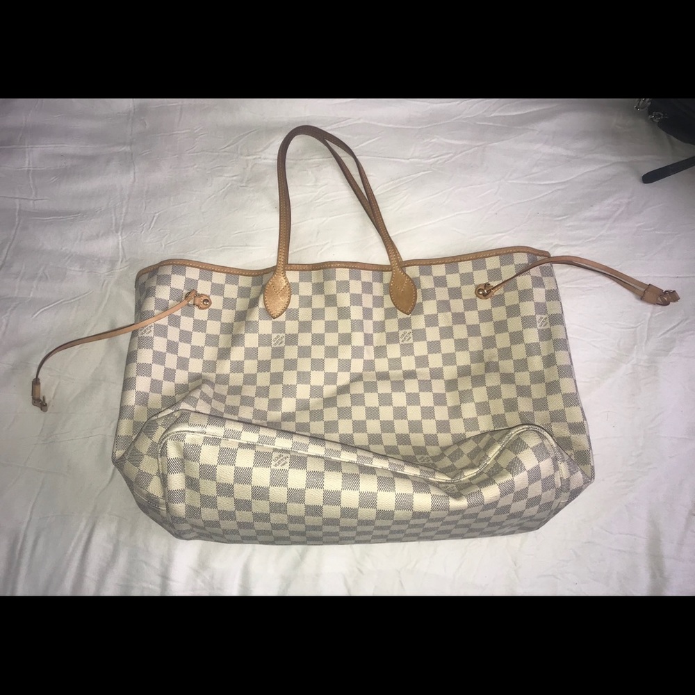 Authentic Louis Vuitton Hobo bag .